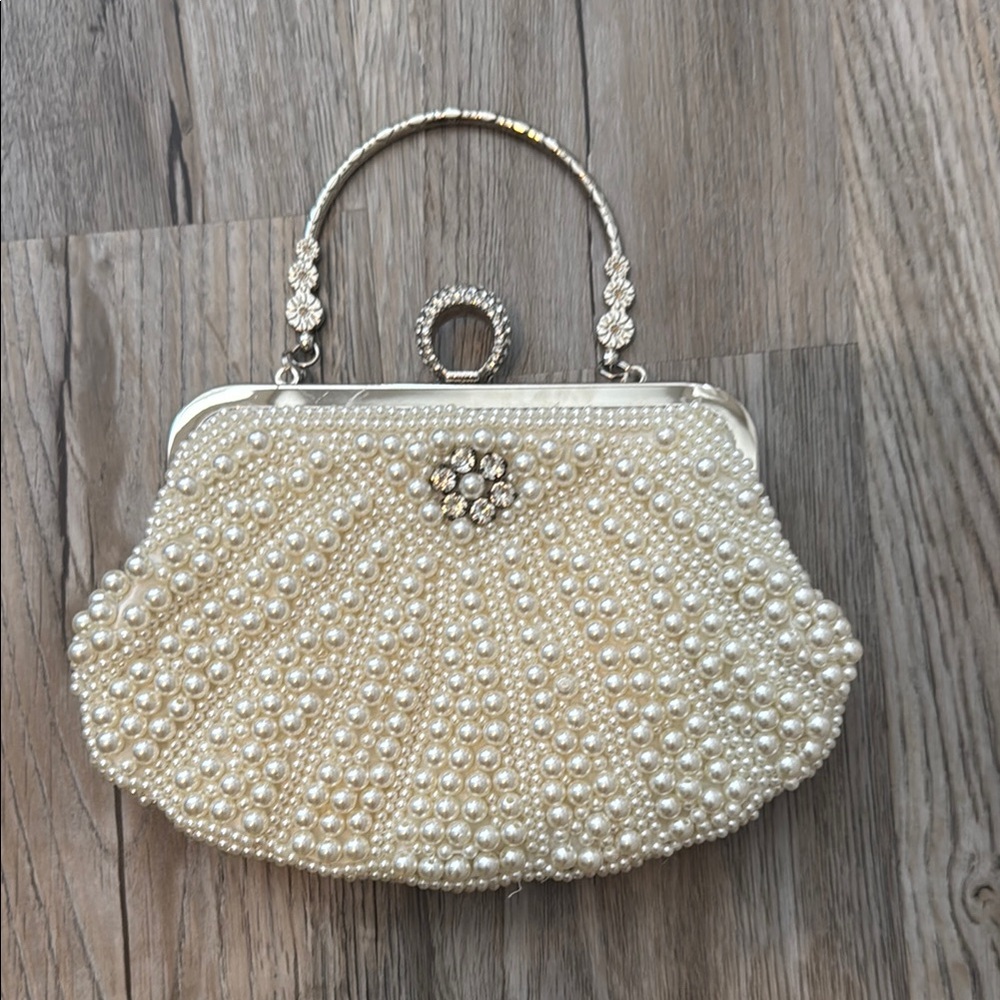 Elegant Pearl-Embellished Cream Clutch